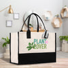 a black and white bag with a plant lover sticker on it