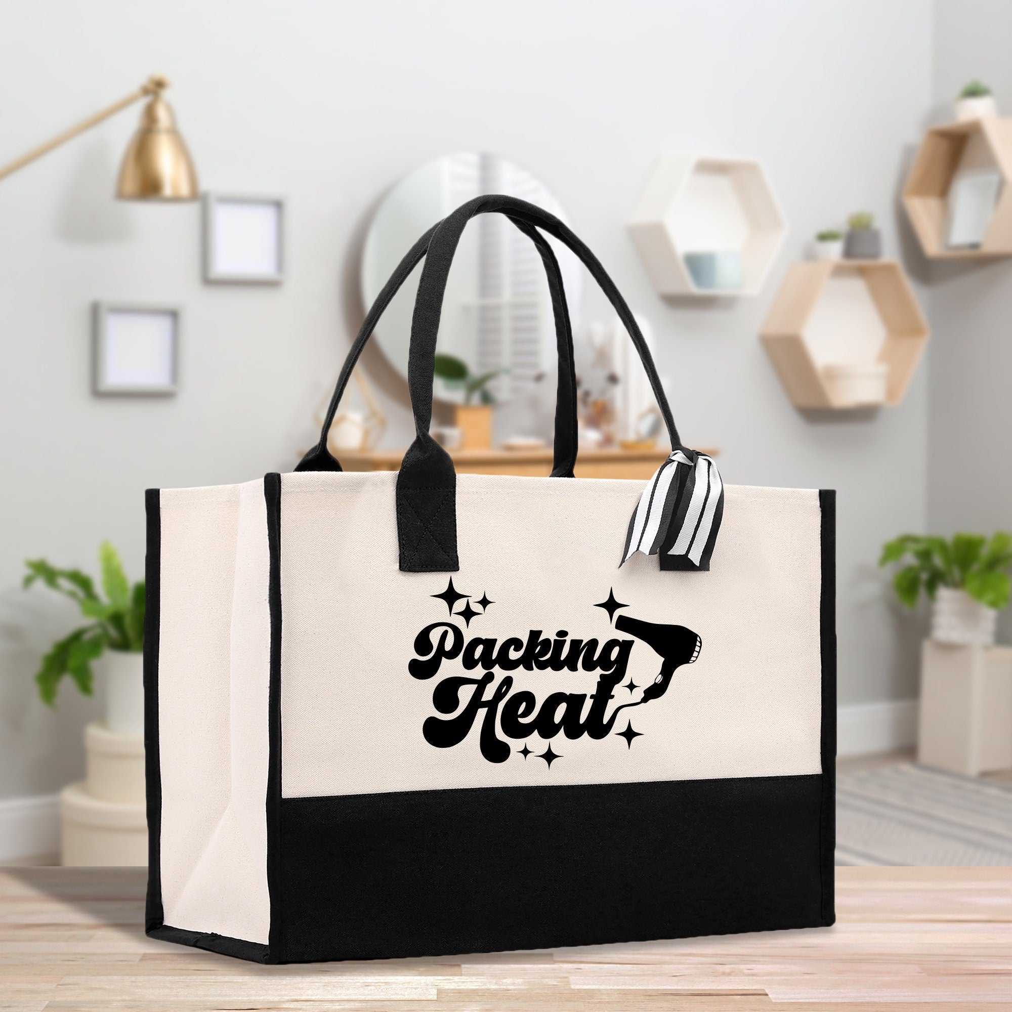 a black and white shopping bag sitting on a table