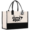 a black and white tote bag with the words packing heat printed on it