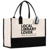 a black and white bag with the words local library lover on it