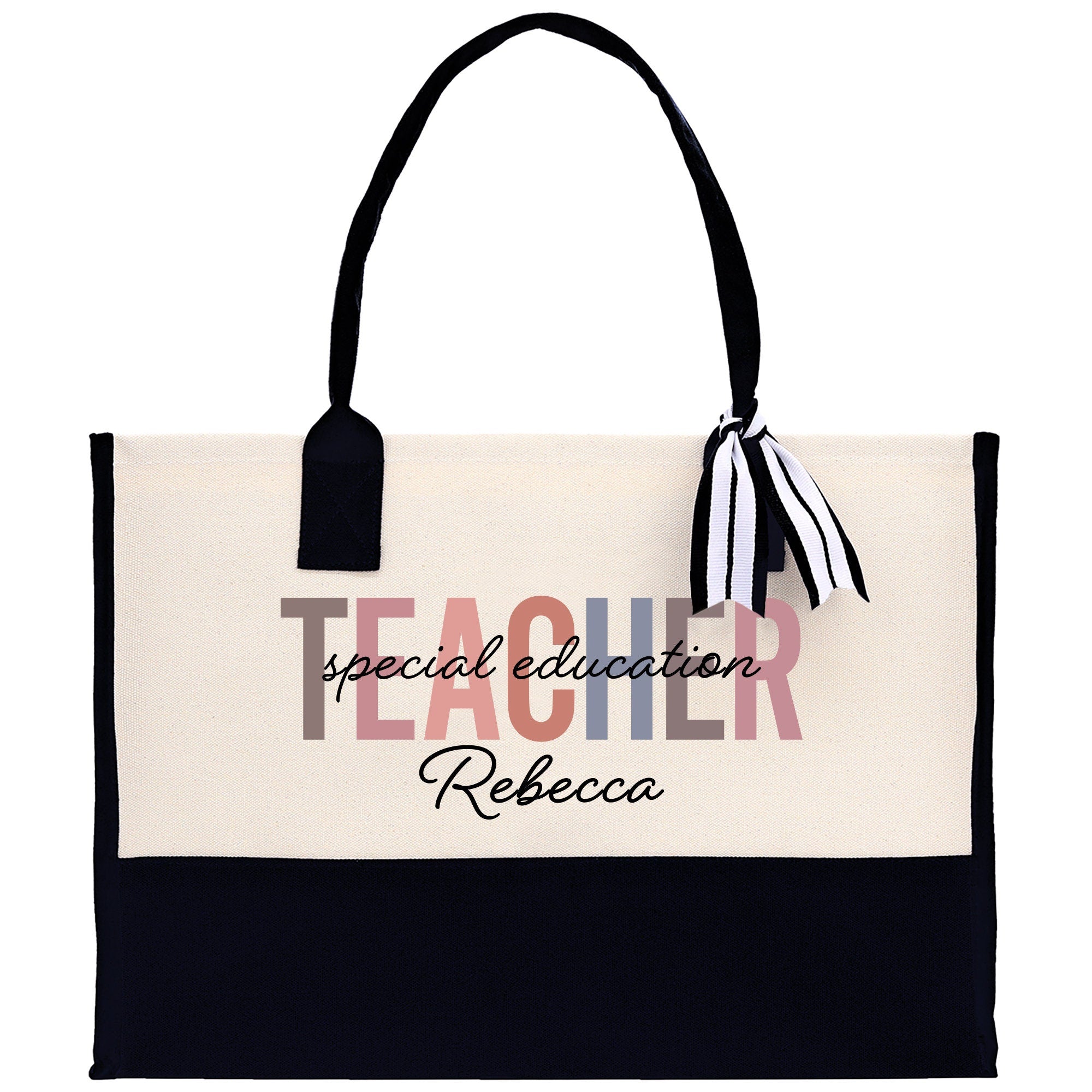 a black and white tote bag with a teacher on it