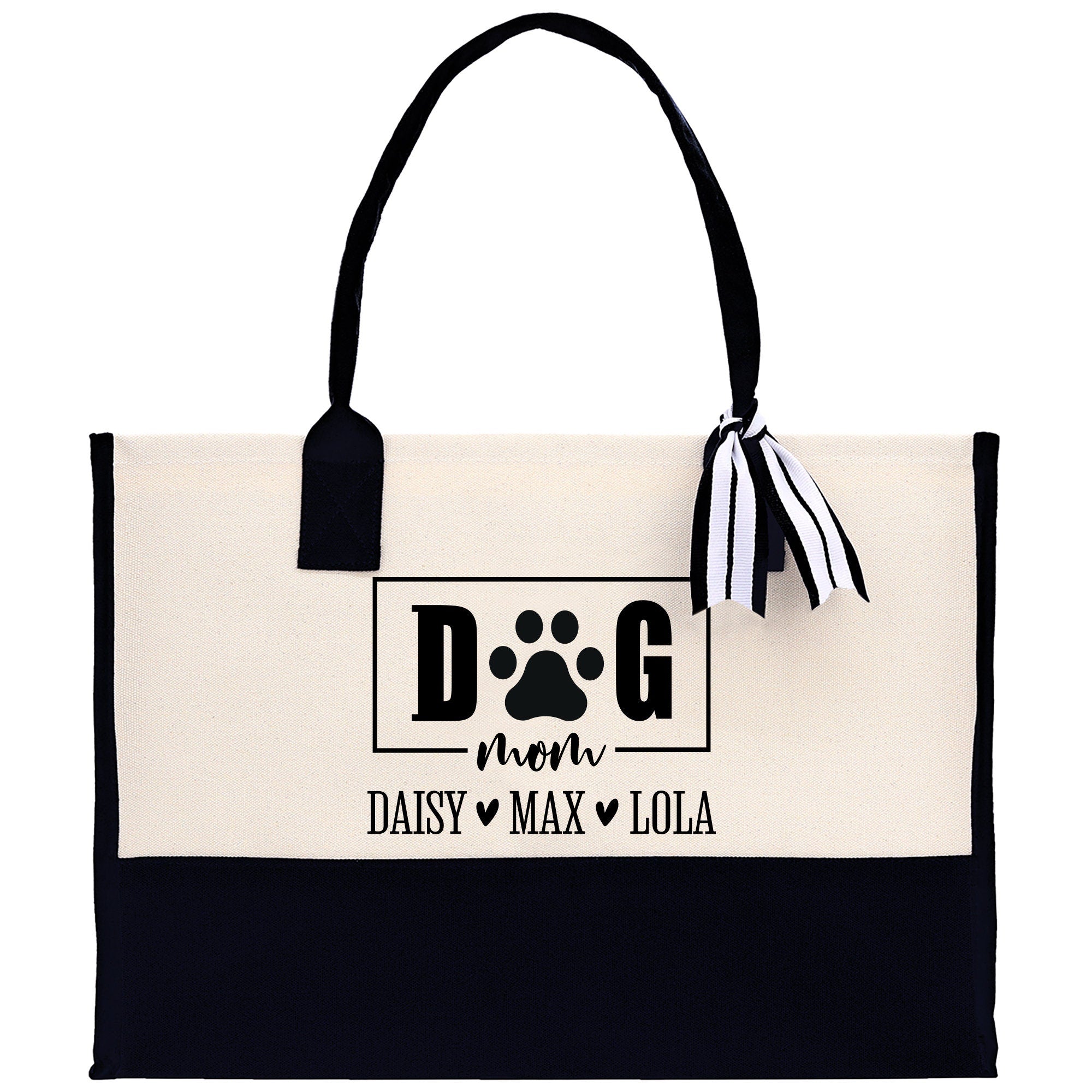 a black and white bag with a dog&#39;s paw on it