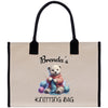 a tote bag with a picture of a teddy bear on it