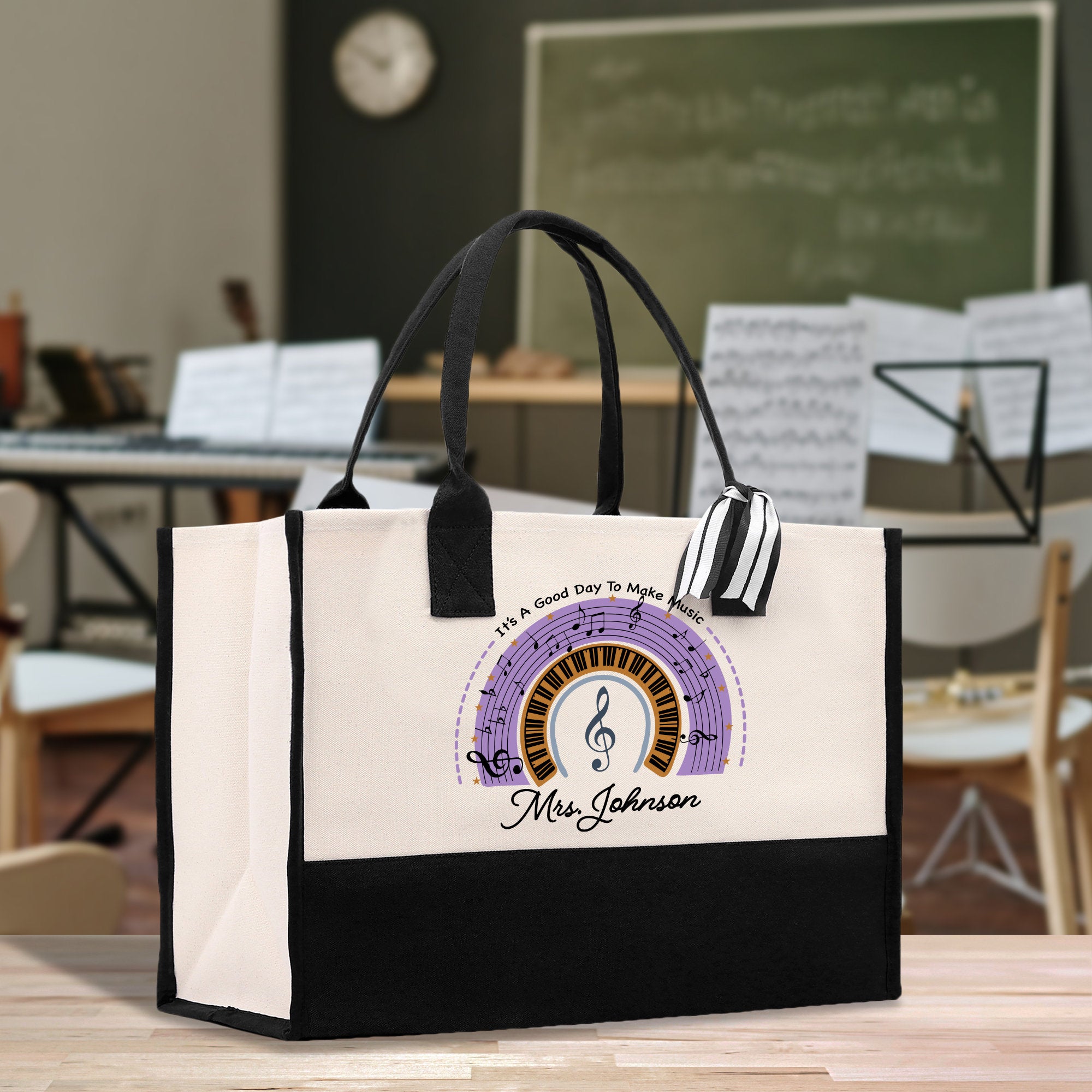 a black and white bag with a musical note on it