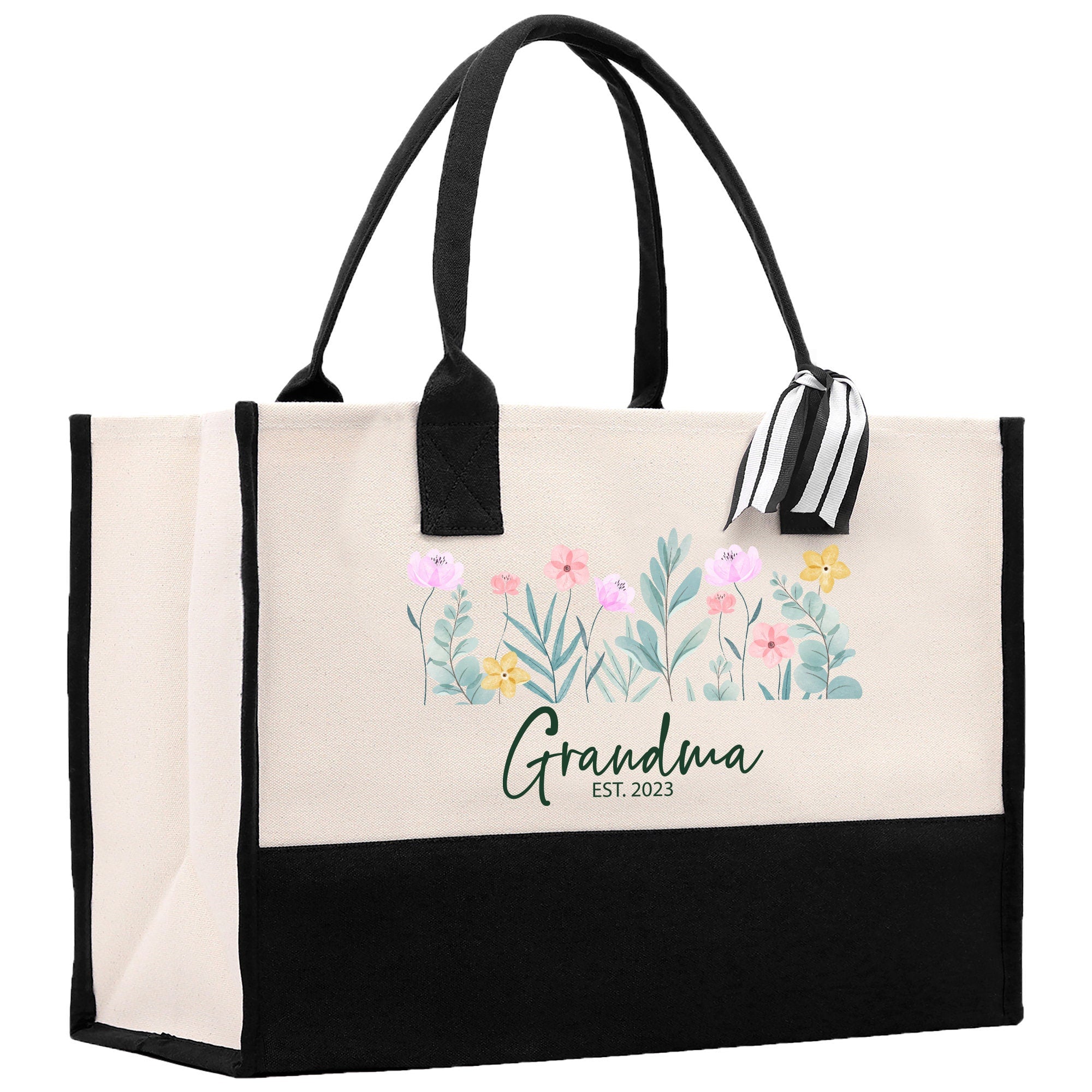a black and white bag with flowers on it
