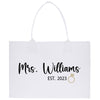 a white shopping bag with a ring on it