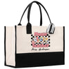 a black and white tote bag with music teacher on it