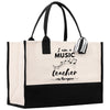 a black and white bag with a music teacher on it