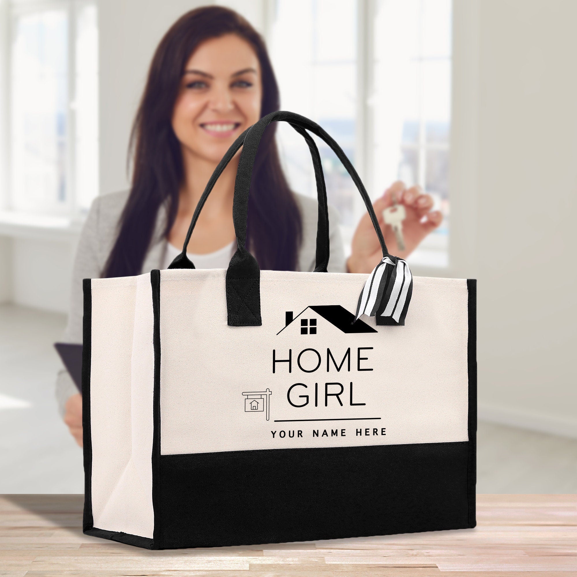 a woman holding a home girl shopping bag