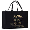 a black shopping bag with a house on it