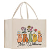 a white bag with flowers and the word bride on it