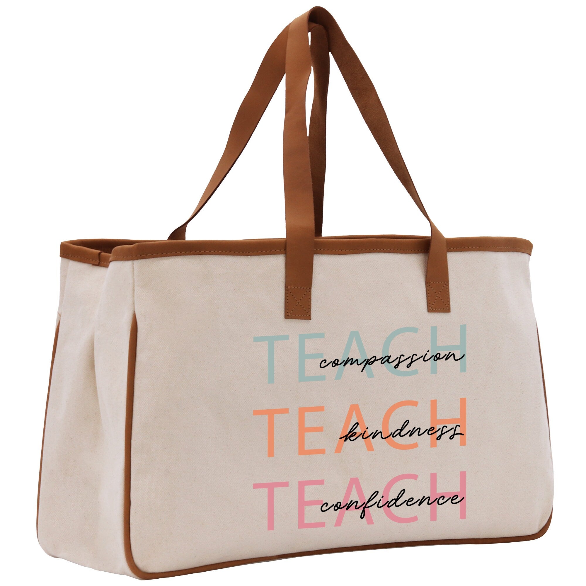 a canvas tote bag with the words teach on it