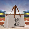 a canvas tote bag with a baseball on it