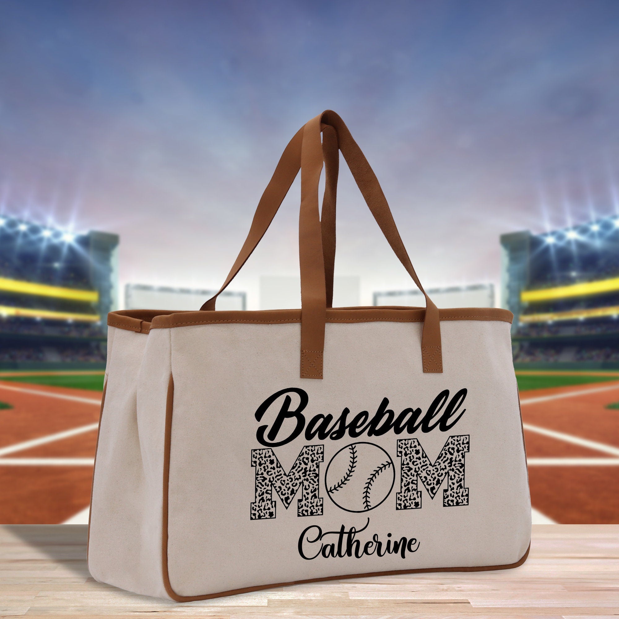 a canvas bag with a baseball mom on it