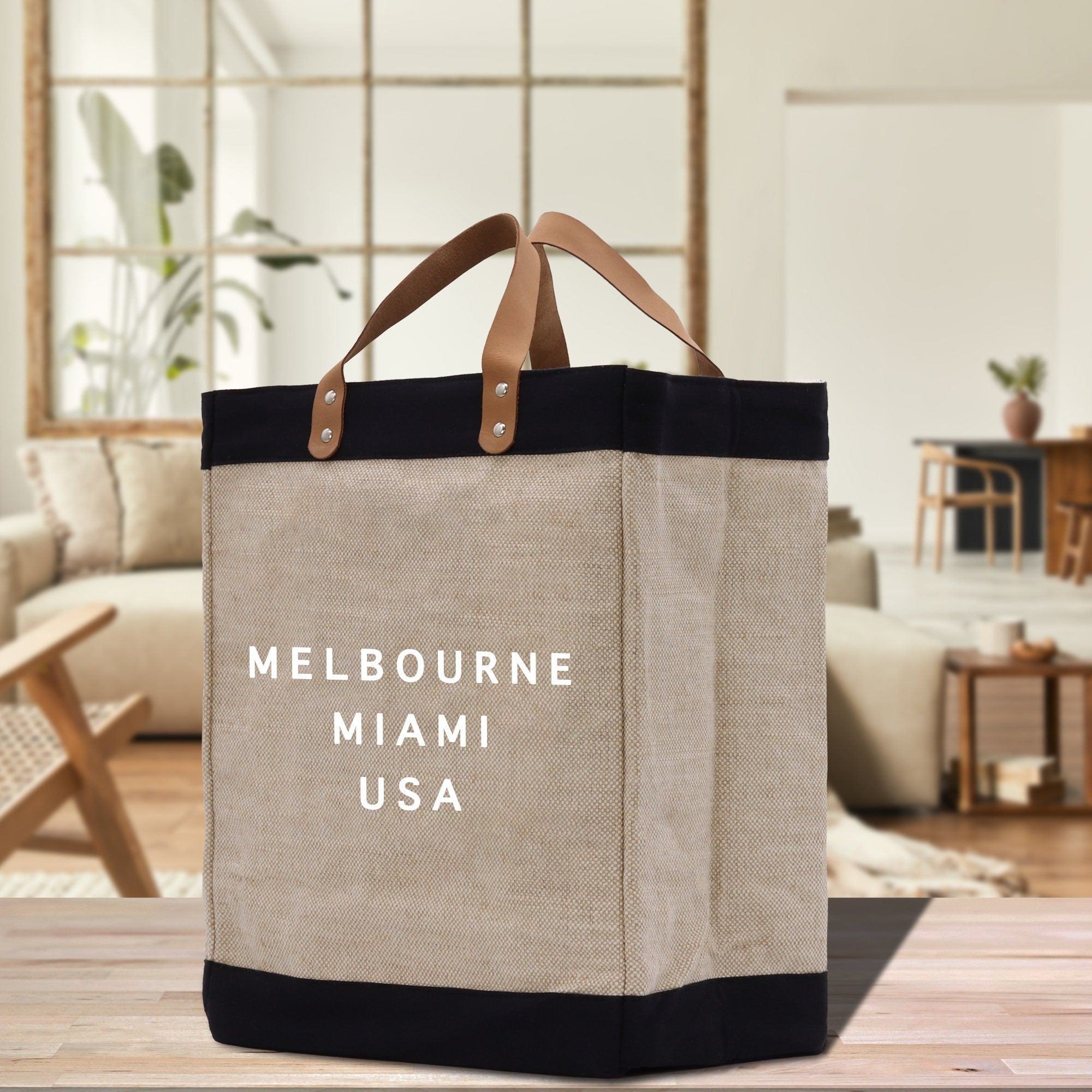 a canvas bag with the words melbourne, miami, usa printed on it