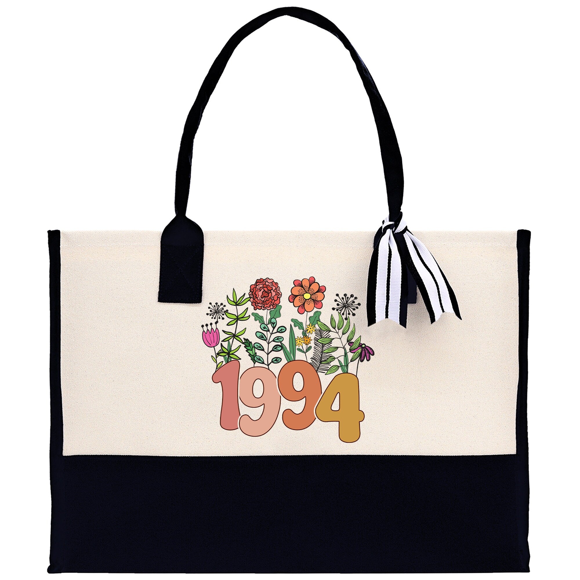 a white and black bag with flowers on it