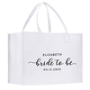 a white bag with a bride to be printed on it