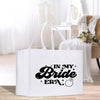 a white bag that says in my bride era