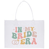 a white bag with the words in my bride era printed on it