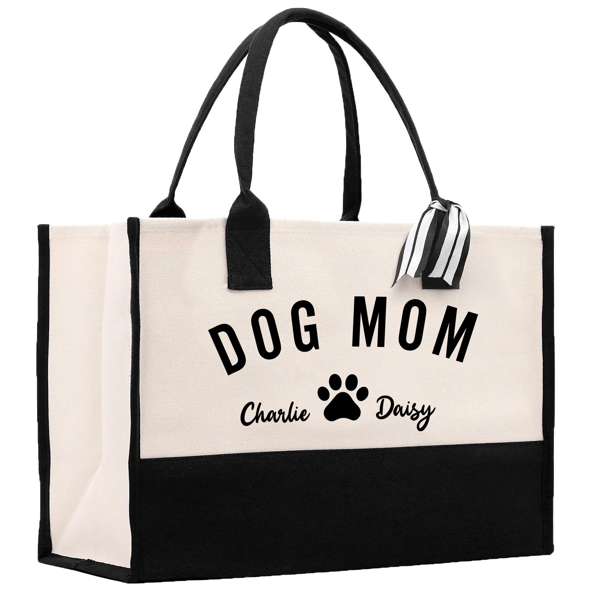 a black and white bag with a dog mom on it