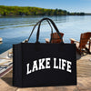a lake life bag sitting on a dock
