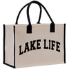 a white bag with black handles and a lake life logo on it