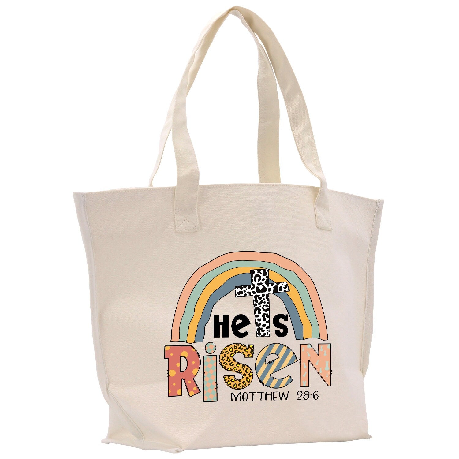 a white tote bag with a rainbow on it