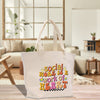 a white tote bag sitting on top of a wooden table