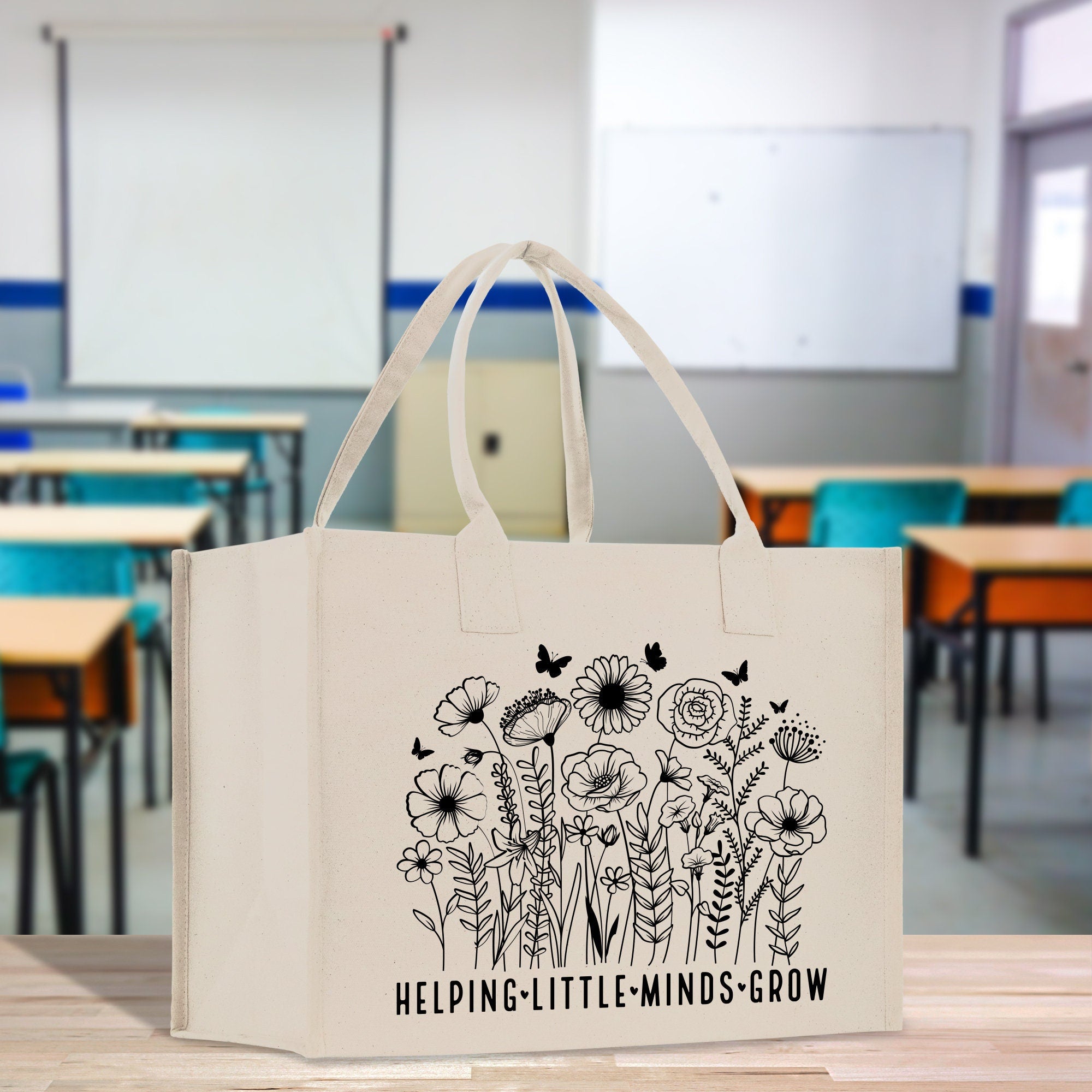 a white bag with a drawing of flowers on it