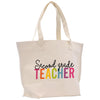 a white tote bag with the words second grade teacher printed on it