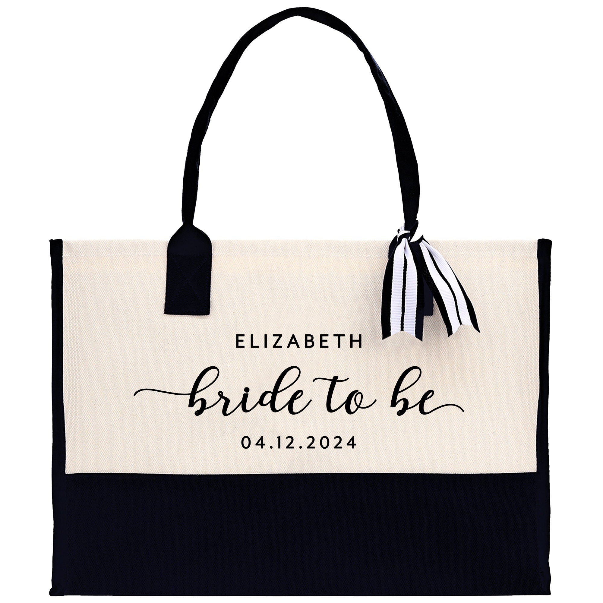 a black and white tote bag with a name on it