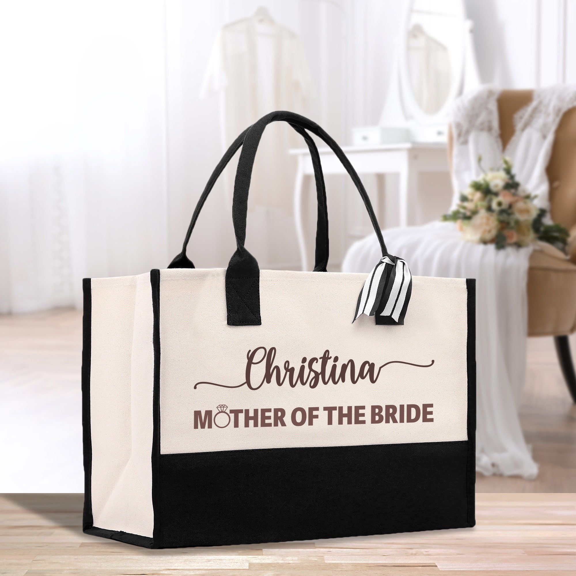a mother of the bride bag sitting on the floor