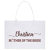 a white shopping bag with brown lettering on it