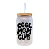 a white mason jar with a straw in it that says cool mom club