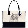 a black and white bag with flowers and a ribbon