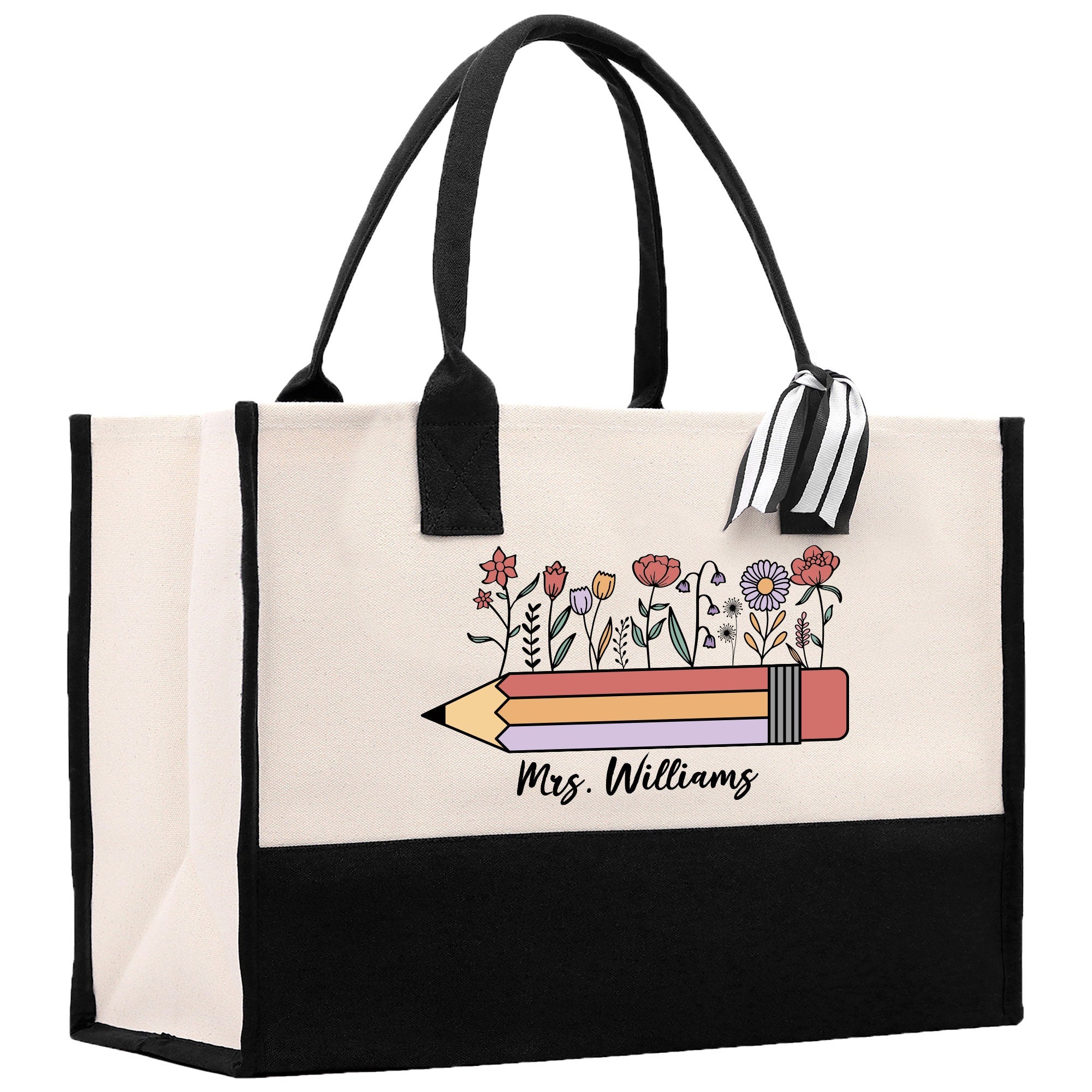 a black and white bag with a pencil and flowers on it