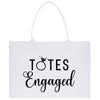 a white tote bag with the words totes engaged printed on it