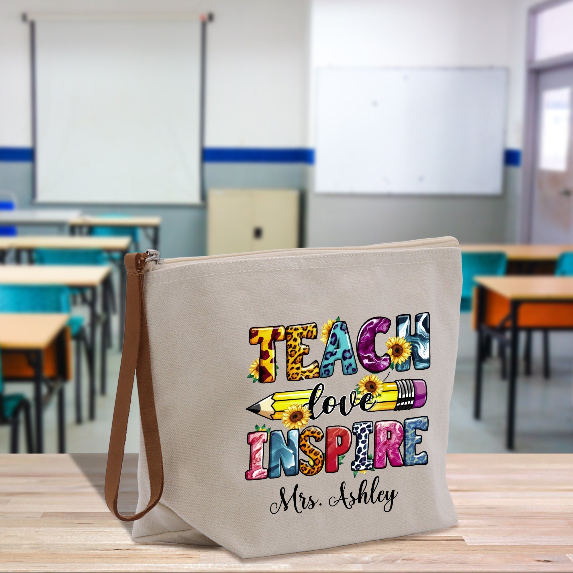 a canvas bag with a teacher quote on it