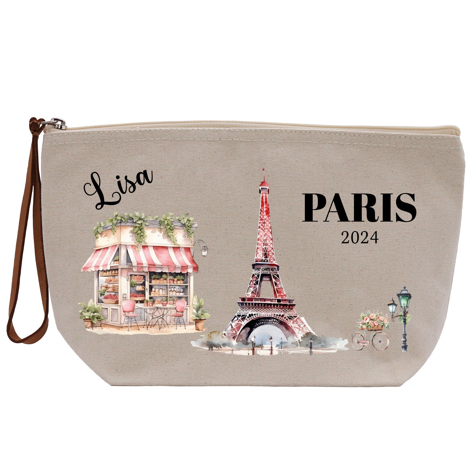 a purse with a picture of the eiffel tower