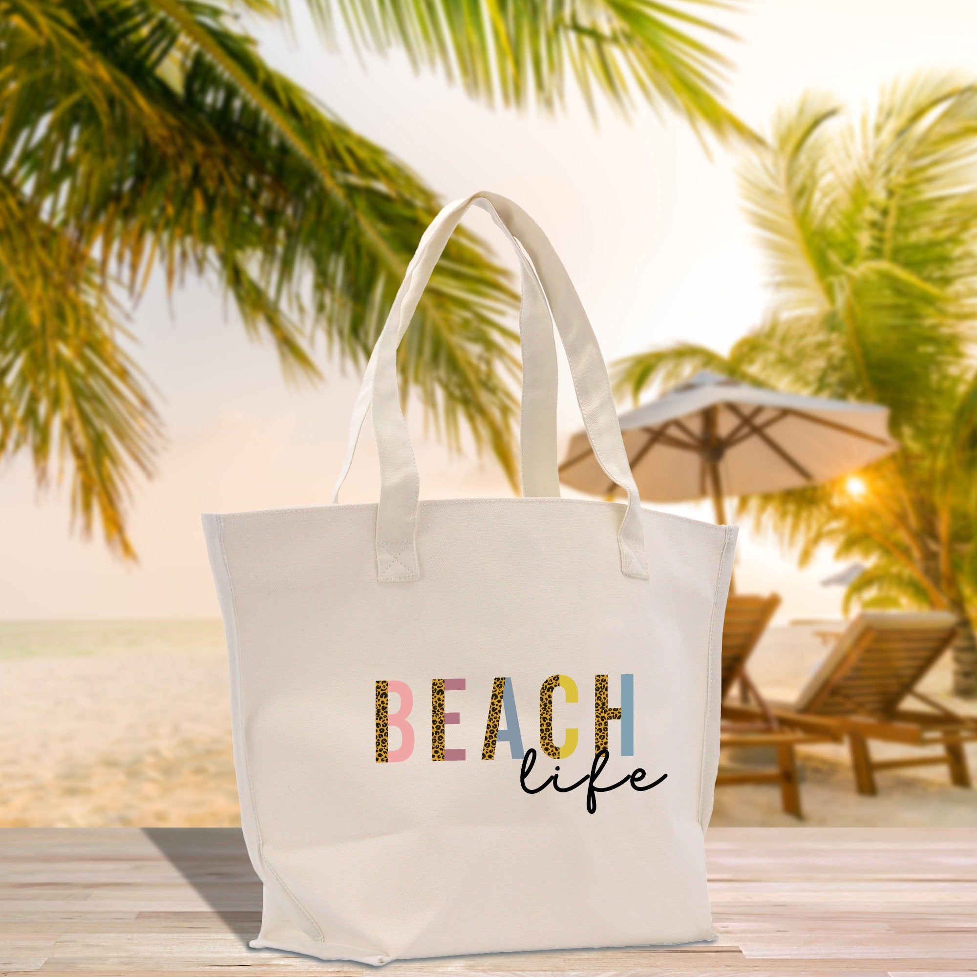 a white beach bag sitting on top of a wooden table