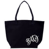 a black tote bag with the word batty printed on it