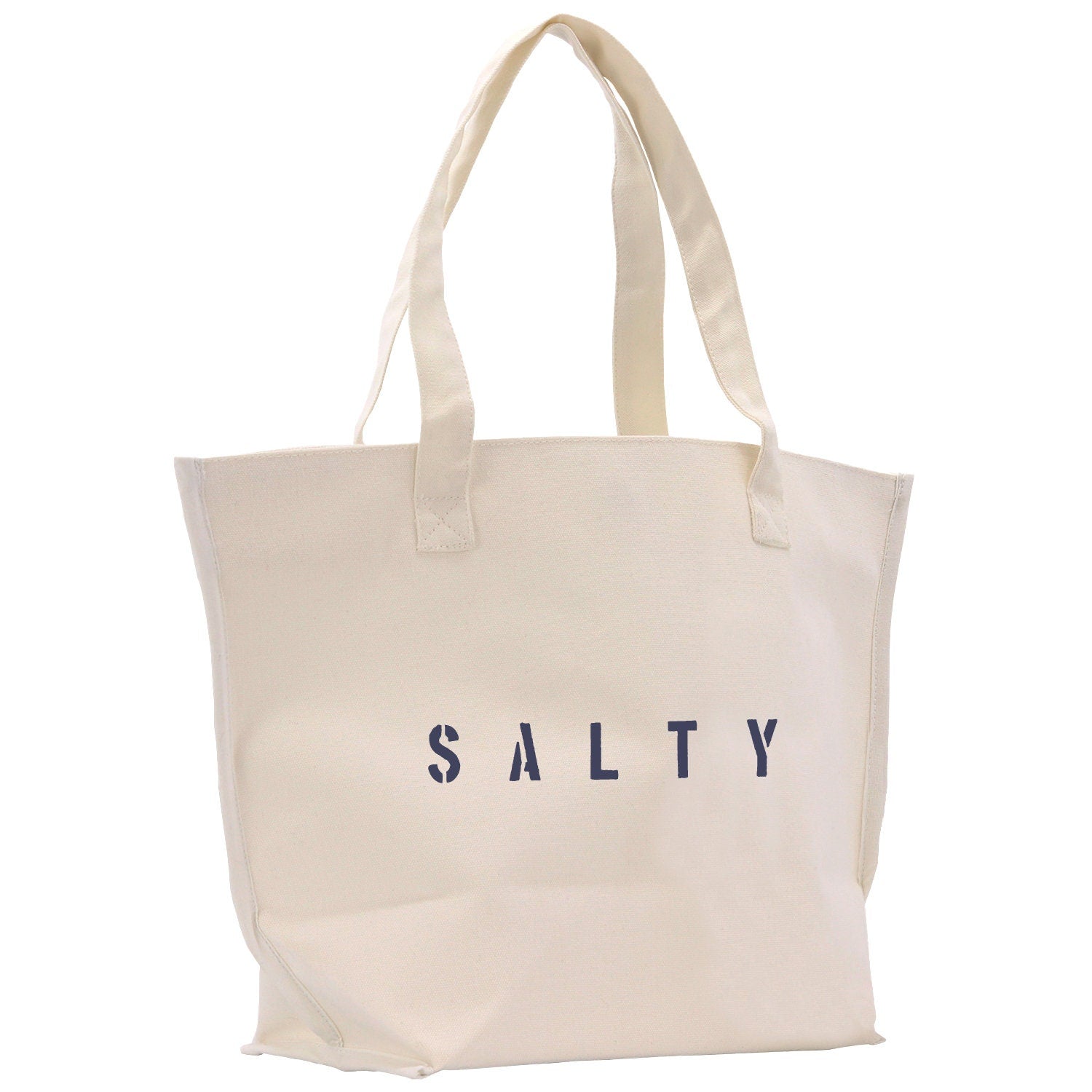 a white tote bag with the word salty printed on it