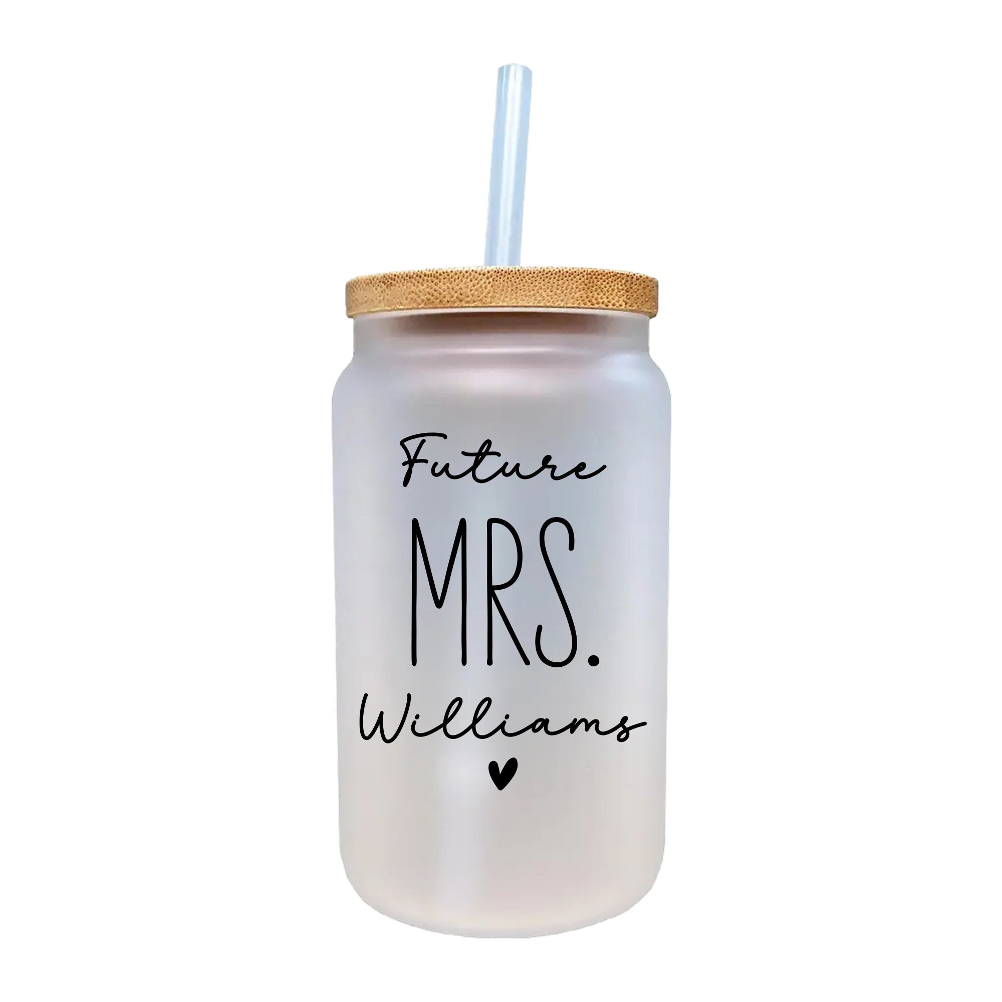 a white mason jar with a straw in it