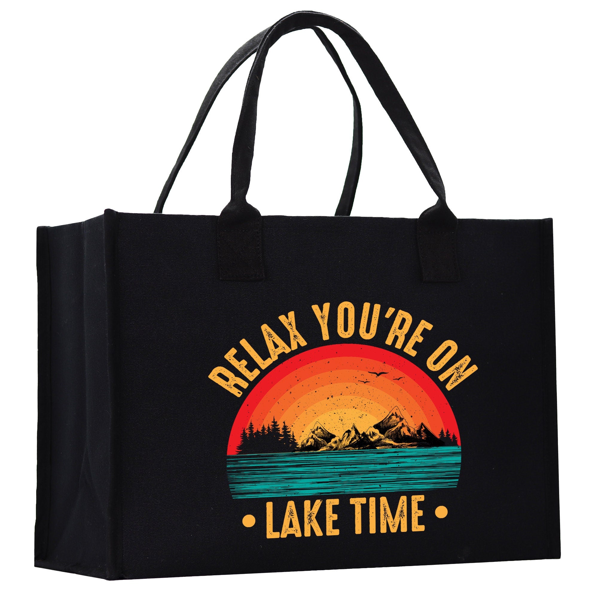 a black tote bag with a lake scene and the words relax you&#39;re