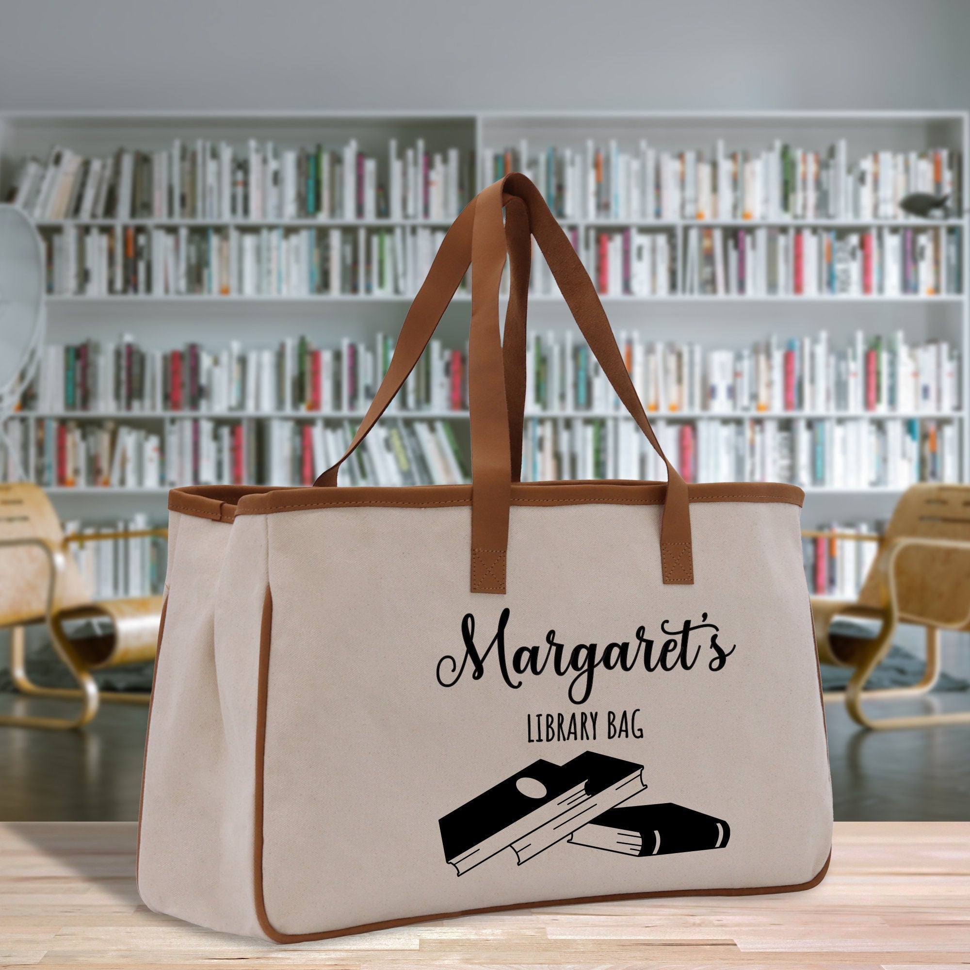 a large canvas bag with a bookcase in the background