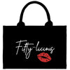 a black bag with a red lip on it