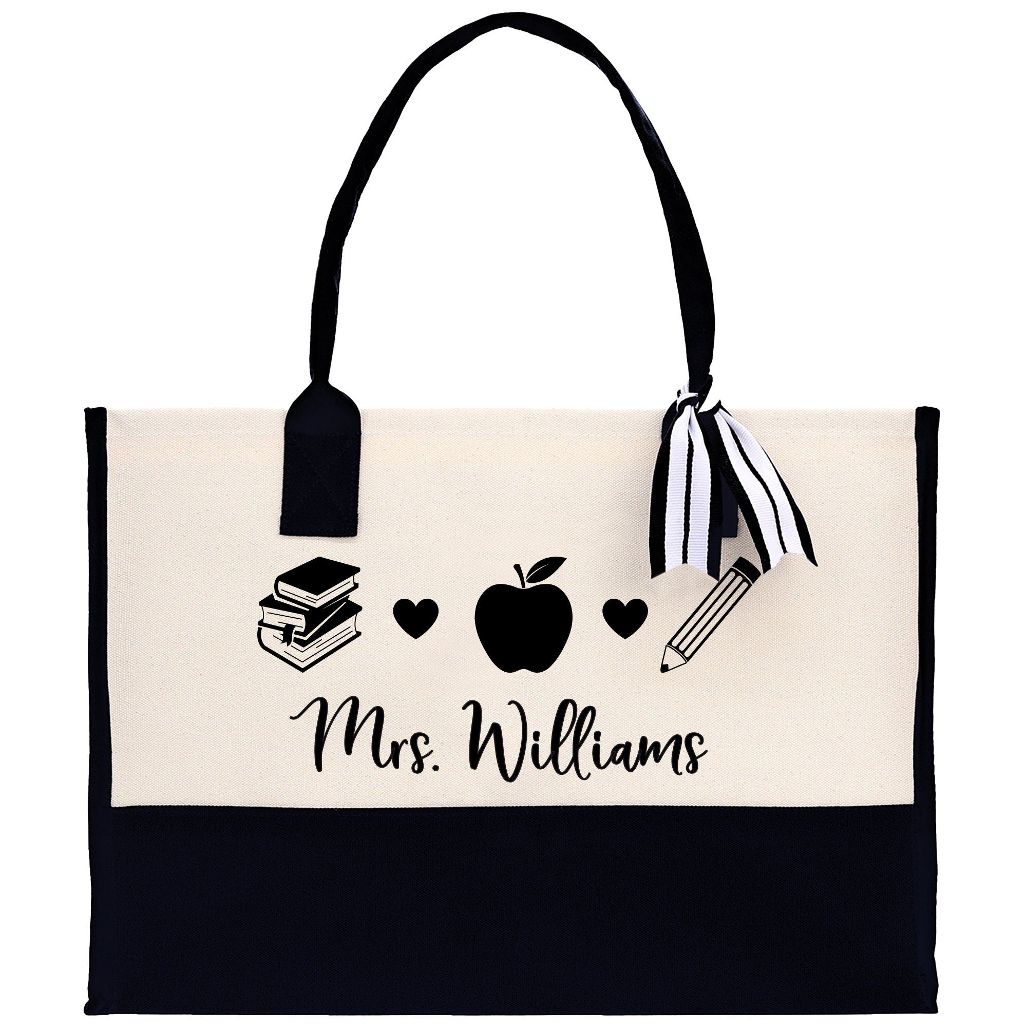 a black and white bag with an apple and books