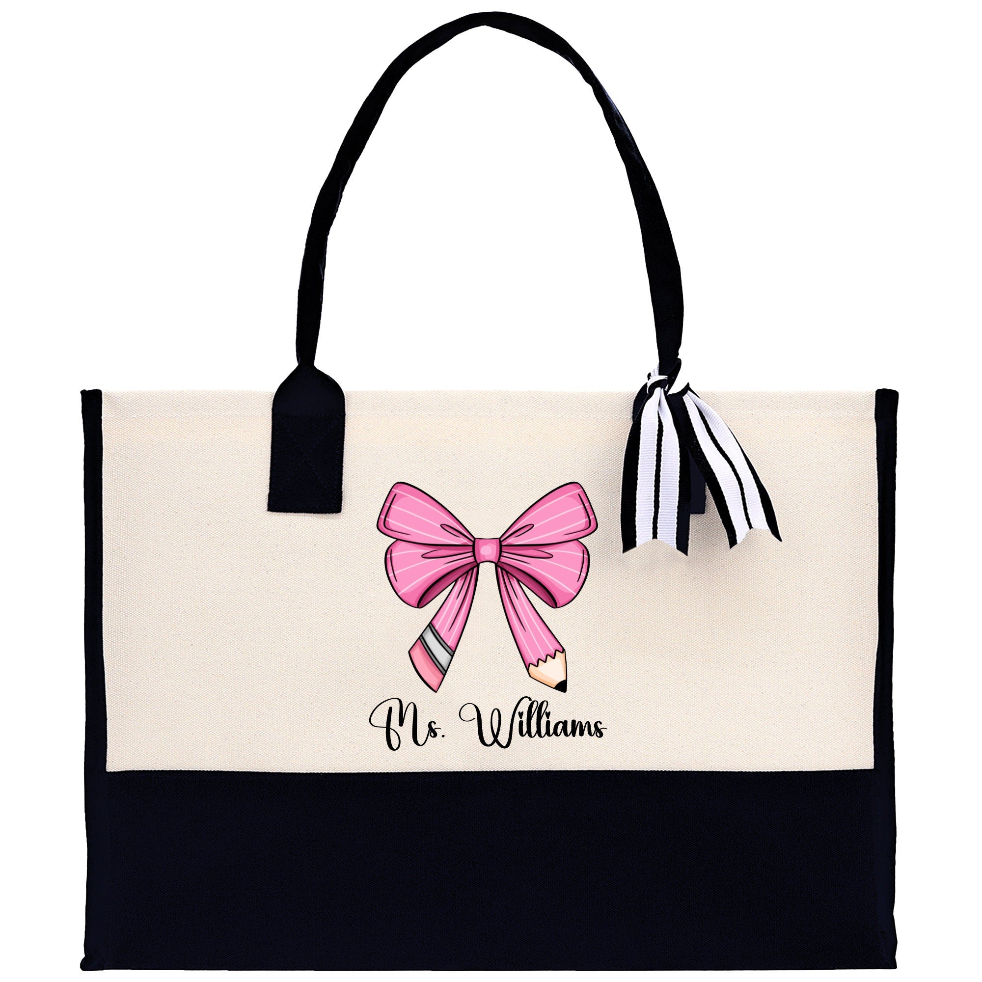 a black and white bag with a pink bow on it