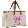 a white bag with a pink bow on it