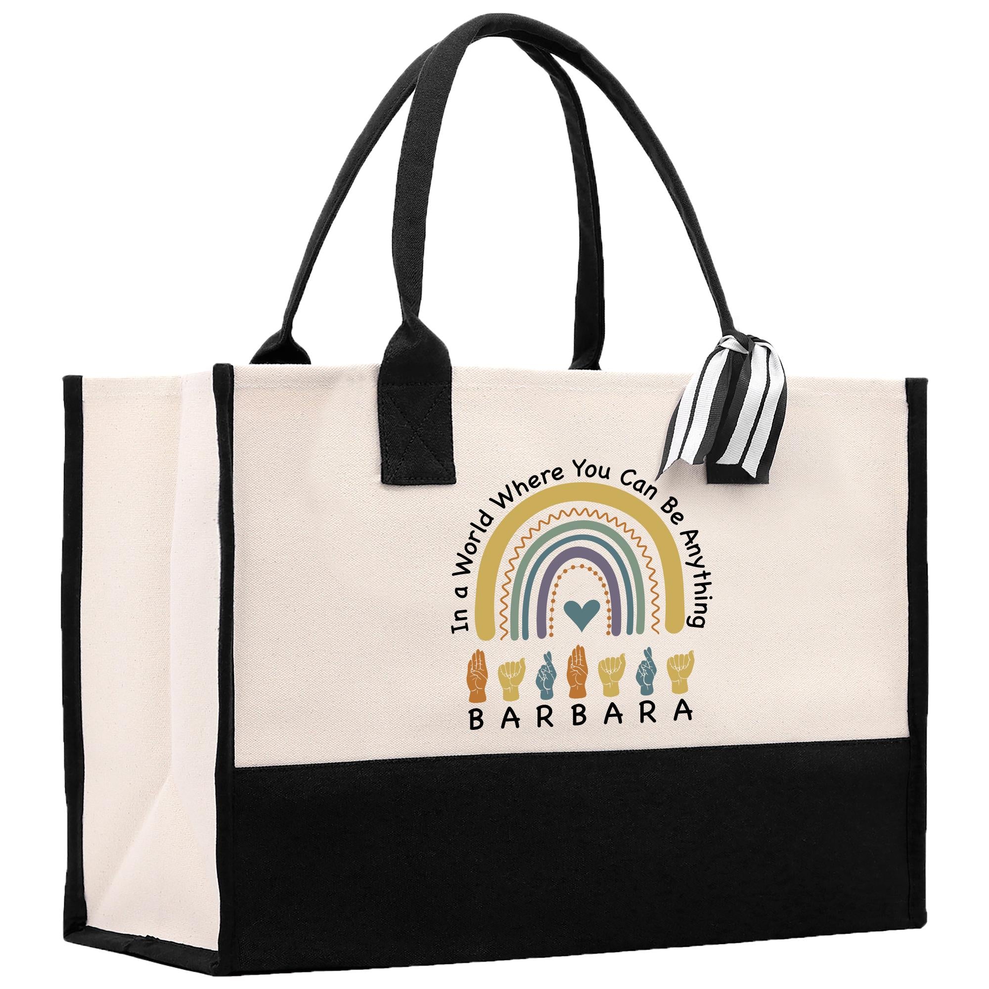 a black and white bag with a rainbow on it